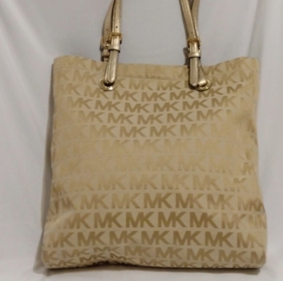 Michael Kors Handbags - Gold and tan Michael Kors shoulder bag